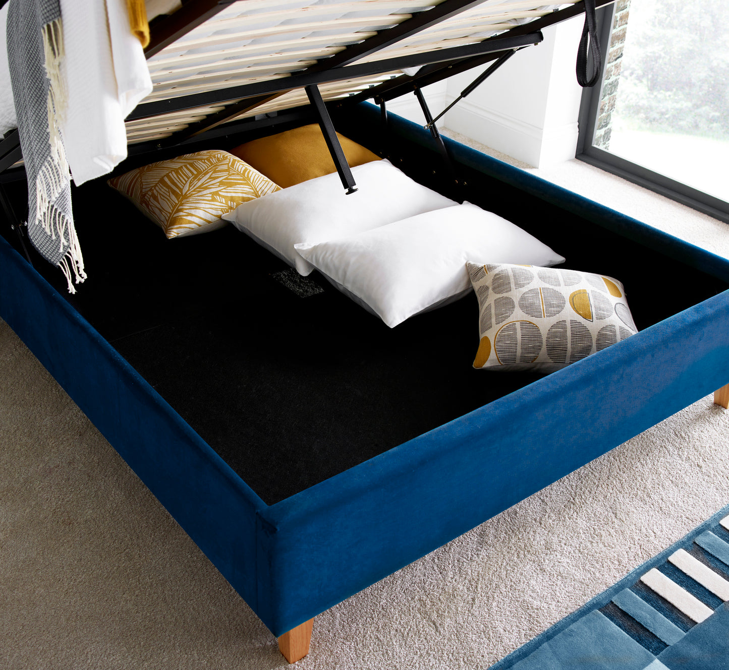 Kingham Blue Velvet Ottoman Bed